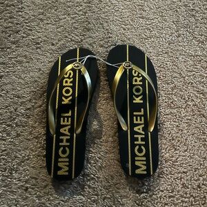 Michael Kors flip flops